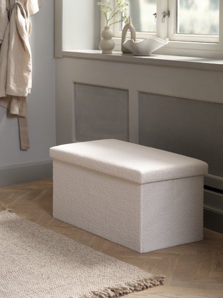 Pouf NYSTED 76x38 a/rangement tissu teddy blanc cassé