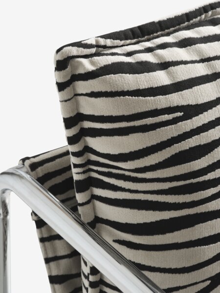 Armchair REMMELS zebra fabric/chrome
